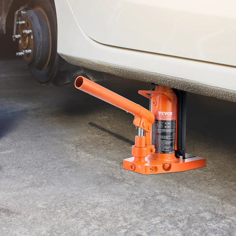VEVOR hydraulic jack, orange steel toe lift, side view under a car.