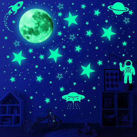 Glow In The Dark Stars And Planets Ceiling Wall Decor Kit With Rockets And Astronauts For A Galaxy Themed Kids Room Or Nursery Bedroom Totally Kid Friendly 1078 Piece Starry Sky Sticker Set featuring glowing moon, stars, and planets on a dark wall