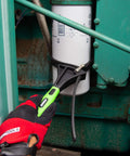 Using Two Piece Rubber Strap Wrench Set For Oil Filters, Pipes, Faucets, And Jar Openers to remove oil filter, close-up