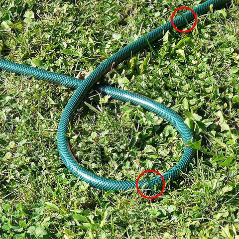 U Shaped Galvanized Steel Ground Pins Garden Stakes And Staples fixing a garden hose on grassy lawn, 6 inch, 40 pack, green