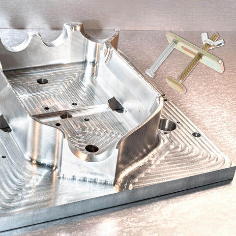 Two Pack Rock Solid Steel Router Hold Down Clamps Kit With Aluminum Bow Shape Reinforced Workholding Fixtures in use on a metal surface