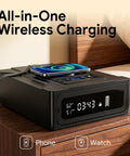 All-in-one wireless charging station on nightstand next to bed, charging phone and watch, digital display showing time and temperature.