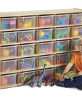 Rock Solid Heavy Duty 25 Cubby Tray Storage With Clear Bins, 25 compartments, wood frame, child organizing toys in classroom.