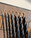 12 Inch Extra Long Brad Point Drill Bit Set 12 Pc Pro Grade High Carbon Steel Long Bits for Wood, displayed on wooden surface.