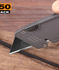 Close-up of utility knife cutting rope with blade from 50 Pack Utility Knife Blades With Blackened SK-5 Steel For Box Cutters.