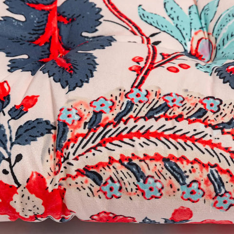 Close-up of outdoor indoor wicker patio seat cushion with blue and red leaves design, 17 x 17 inches, washable polyester pad