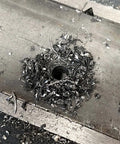 Hole drilled in metal surface using Beast Heavy Duty Cobalt Drill Bit Set 1/16 To 1/2 Inch, 17 Piece M35 High Speed Steel Twist Bits