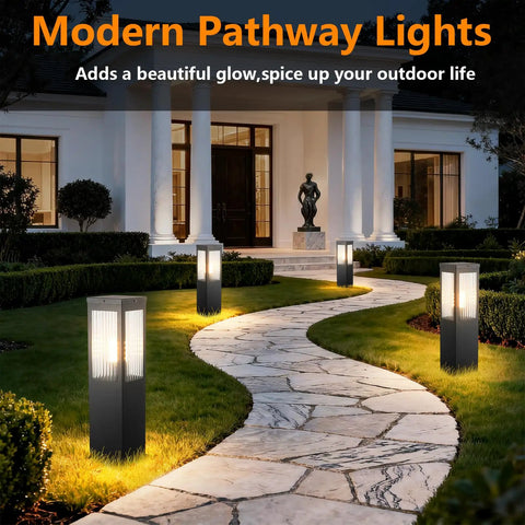 Heavy Duty Outdoor Path Light 15.75 Inches Modern Landscape Bollard illuminating a stone pathway in a garden setting.