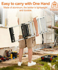 Beefed Up 6 Step Aluminum Folding Ladder With Wide Flared Base, Portable Compact Step Stool, Supports Up To 330 Lbs, Great For Home Garage DIY Projects And Heights. Man carrying folded aluminum ladder