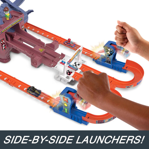 Hands using slam-launchers on Hot Wheels RacerVerse Spider-Man Web-Slinging Speedway Track Set With Spider-Man And Black Panther Epic Multi-Lap Race From Slam-Launchers To Outspeed Doc Ock Kids Zoom Through The Web Of Action.