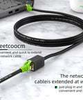 Cat6a Shielded Ethernet Extension Cable 20 Feet Upward Angled RJ45 Patch Cable connected to laptop on desk
