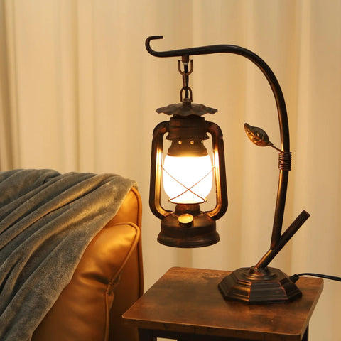 Rustic Lantern Table Lamp With Glass Shade For Living Room And Bedroom Cozy Nightstand Lighting For End Tables Farmhouse Style Bedside Lamp That Delivers Warm Homey Vibe on wooden table