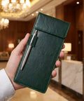 Double Layer Magnetic Signature Board With Soft Leather Cover And Built In Pen Sleeve For Restaurant Receipts And Office Signing Compact Counter Pad held in hand.