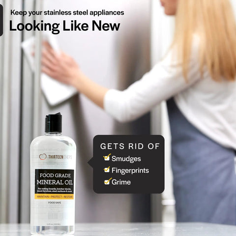 Bottle of Food Grade Mineral Oil For Wood Cutting Boards, Countertops And Butcher Blocks against stainless steel appliance