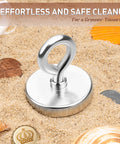 FINDMAG 2-inch neodymium fishing magnet with lifting eye bolt, front view on sand