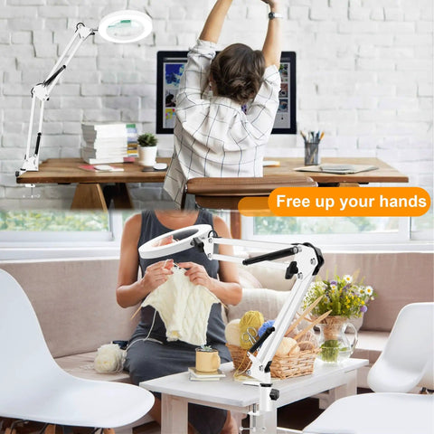 Person using 10X Magnifying Glass With Light And Stand Handy Hands Free Desk Lamp Magnifier With Real Glass Lens at a desk and crafting.