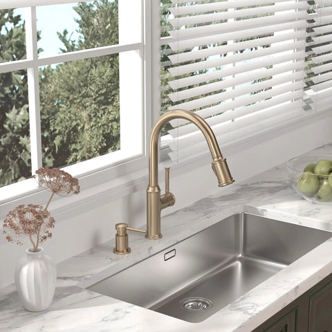 Image of Sharp Looking Champagne Gold Kitchen Faucet With Pull Down Sprayer And Single Handle Mixer over a stainless steel sink.
