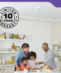 Family cooking together under a Premium Smoke And Carbon Monoxide Detector Hardwired With Aa Battery Backup 3 Pack in kitchen.