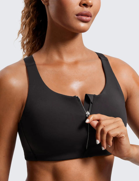 Model wearing Zip Front High Impact Sports Bra With Molded Cups, Wireless Convertible Straps, black, size 36C, front view.