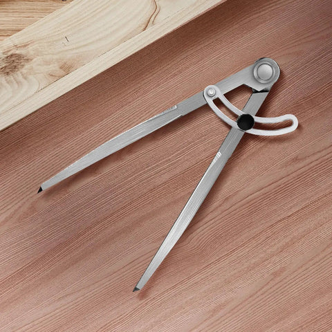 Heavy Duty Six Inch Alloy Metal Compass Scribe Dead Nuts Accurate Layout Divider For Precise Woodworking Marking And Measuring On Plastic Wood Or Steel Panels on a wooden surface.