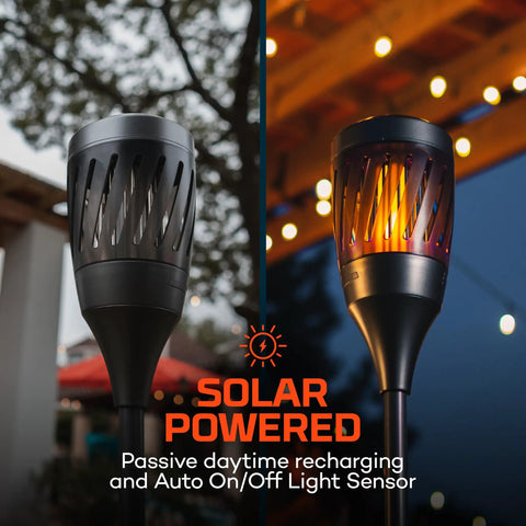 Outdoor Solar Torch Zapper Bug Light With Warm Tiki Torch Ambience Solar Powered And Rechargeable Battery Keeps Mosquitoes Flies And Gnats Away Three Light Modes For All Night Yard Vibes shown in glowing mode next to patio setup.