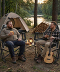 Two men relaxing in Ultra Comfy Portable Hammock Camping Chair With Adjustable Backrest beside a river with a tent and guitar.