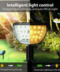 Solar Landscape Spotlight Kit With 32 LED Outdoor Wall Lights IP65 Waterproof 4 Pack showing daytime charging and nighttime lighting