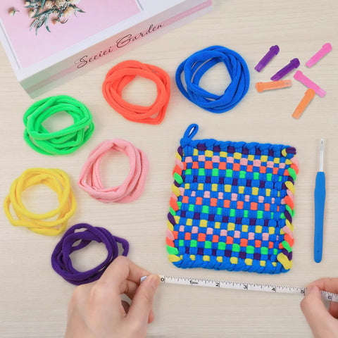 Easy Potholder Loom Craft Kit For Kids And Beginners with colorful woven potholder and rainbow loops on table