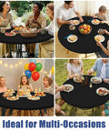 People dining with Round Spandex Tablecloth With Elastic Edge No Slip Waterproof Stretch Fit For 45 To 56 Inch Tables Ideal For Indoor Outdoor Dining And Camping Picnics Easy Care Washable Black.