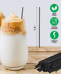 Skinny Black Plastic Sip Stirrer Straws For Coffee And Cocktails, Seven And A Half Inch Stirrers, 1000 per box next to drinks