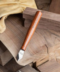Premium Woodworking Marking Knife With Razor Sharp High Carbon Steel Blade And Durable Wooden Handle on wood pieces.