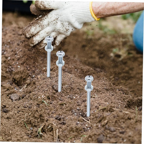 Side view of metal spikes penetrating soil, part of Heavy Duty Lawn Aerator Shoes With Metal Spikes For Deep Soil Aeration And Lawn Health Ten Pack Reusable Grass Shoes For Easy Yard Maintenance Durable Spike Boots Built To Promote Healthier Grass outdoors