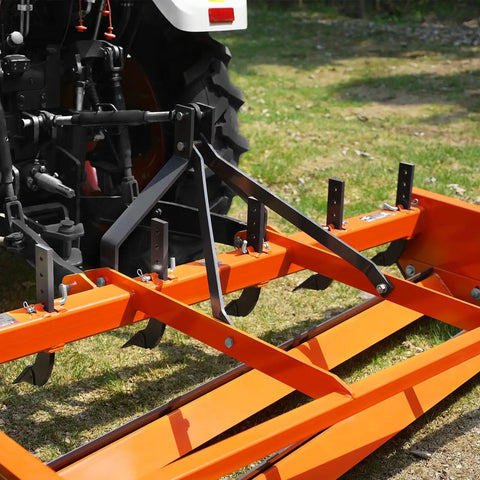 Heavy Duty 72 Inch Tractor Land Leveler Scraper Grader Attachment with 3 Point Cat 1 Hitch on rugged terrain