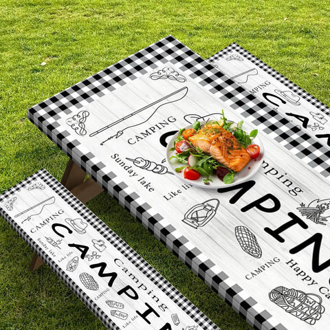 Three Piece Picnic Table Cover Set With Bench Covers, Elastic Edges, Farm Plaid Fitted Tablecloth, 72 Inch Outdoor Patio Camping Essentials, Waterproof And Windproof, Includes Drawstring Storage Bag displayed on grass with food