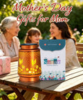 Outdoor Solar Lantern With Hummingbird Pattern, Waterproof Metal Garden Light for gift-giving, packaging visible, on a table