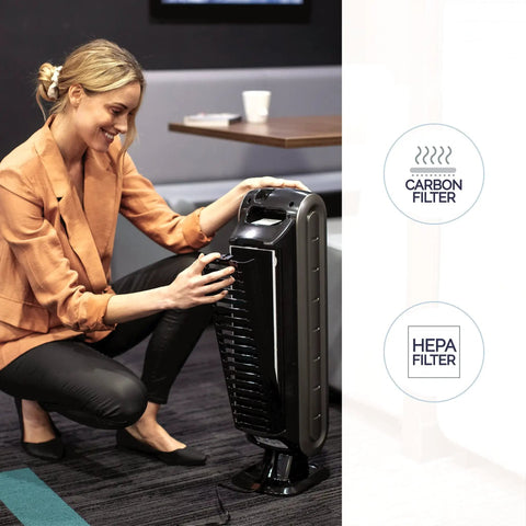 Woman adjusting No Nonsense 4 Stage Hospital Grade Filtration Air Purifier With True HEPA For Small Rooms 100 To 200 Sq Ft Ultra Quiet