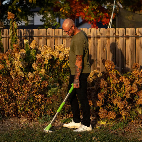 Heavy Duty Stand Up Weed Puller Tool With 40 Inch Handle 3 Claws And Fiberglass Foot Pedal Cast Iron Dandelion Weeder For Easy Weeding Without Bending Or Kneeling Built To Last Like A Boss used in a backyard garden