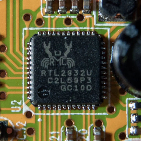Close-up of RTL2832U IC on circuit board for Budget USB RTL SDR And ADS B Receiver Kit With R820T2 Tuner MCX Input ESD Safe
