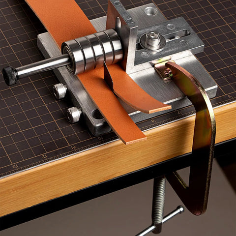 Manual Leather Strap Cutter For 60mm Width, Belt Cutting Machine With G-Clamps, 10 Sharp Blades in use on workbench