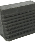 Black molded wheel chock with ribbed sides and metal ring, 9 in L x 8 in W x 5.75 in H.