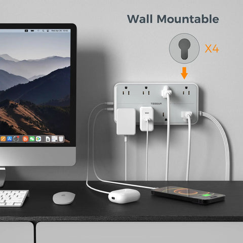 Ultra Slim Flat Power Strip Surge Protector With Eight Wide Spaced Outlets And Three Usb Ports Featuring Six Foot Cable on wall with devices.