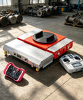 Built Like A Tank Heavy Duty High Capacity Electric Transfer Cart With One Touch Remote Control Featuring Trackless Design For Rugged Workshop Floors Industrial Hauling, showing remote and thick steel deck.