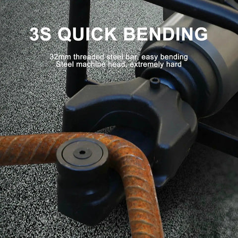 Close-up of Powerful 1800W Electric Rebar Bender Machine With Hydraulic System For Steel Bars Up To 32Mm bending a 32mm threaded steel bar.