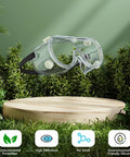 Anti-Fog Safety Goggles For Lab Use With ANSI Z87.1 Rating, Adjustable Fit Over Glasses Design, floating over a grassy backdrop.