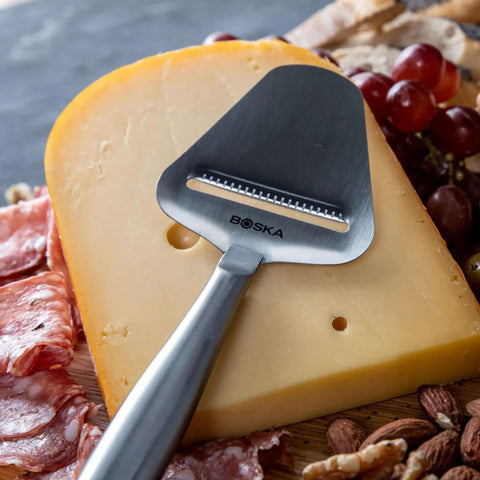 Stainless Steel Cheese Slicer Copenhagen Multifunctional Kitchen Tool For All Types Of Cheese Grating Hard Cheese Citrus Fruits Carrots And More Handheld Nonstick Blade Dishwasher Safe Lightweight Design on cheese wheel
