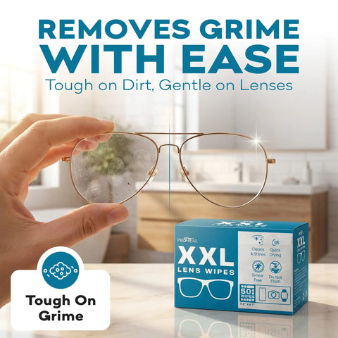Hand holding clean glasses above a box of Big Lens Wipes 50 Count For Glasses, Watches, Screens And More Clean Smudge Free With Quick Dry Isopropyl Alcohol Streak Free Shine Wipes 9.8 By 6.7 Inch For Lenses And Displays.