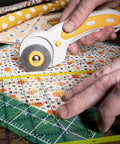Self Healing Cutting Mat And Rotary Cutter Set For Fabric 9x12 Inches, Ideal For Quilting And Sewing Projects, close-up in use