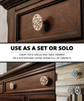 Aged Bronze Compass Rose Drawer Pulls Set Of 12, Durable Cast Iron Cabinet Hardware Knobs for Rustic Home Decor in use on wooden cabinets.