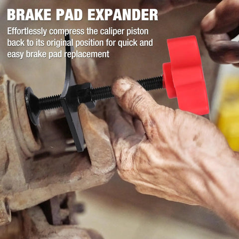 Using Brake Pad Spreader And Caliper Tool For Cars And Light Trucks With 360 Degree Swivel Joint Piston Compressor in close-up.