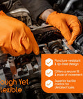 Orange disposable gloves worn by a mechanic working on an engine